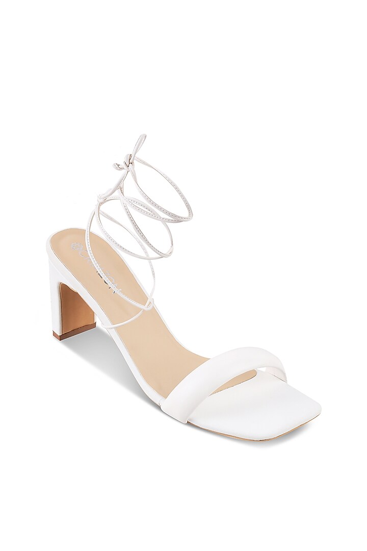 White Faux Leather Block Heels by Crimzon at Pernia's Pop Up Shop