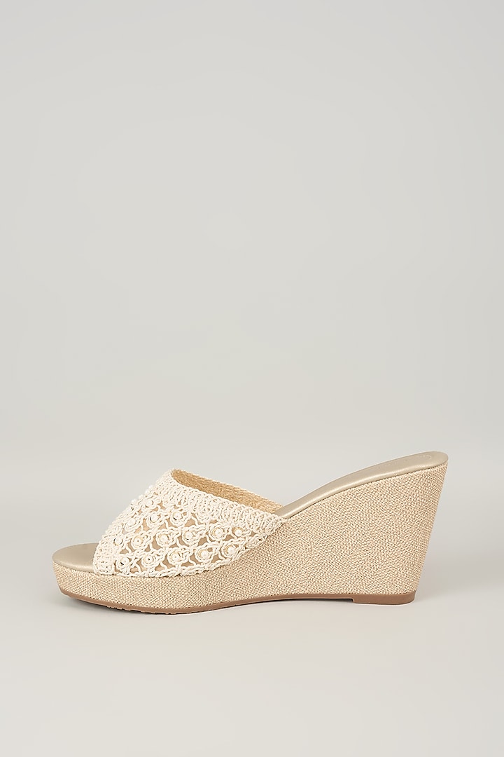 Ivory Faux Leather Wedges by Crimzon at Pernia's Pop Up Shop