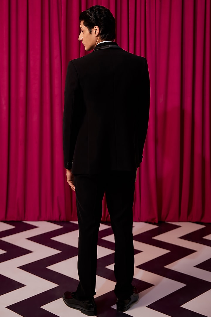 Black Textured Suiting Embroidered Tuxedo Set by Contrast By Parth at Pernia's Pop Up Shop