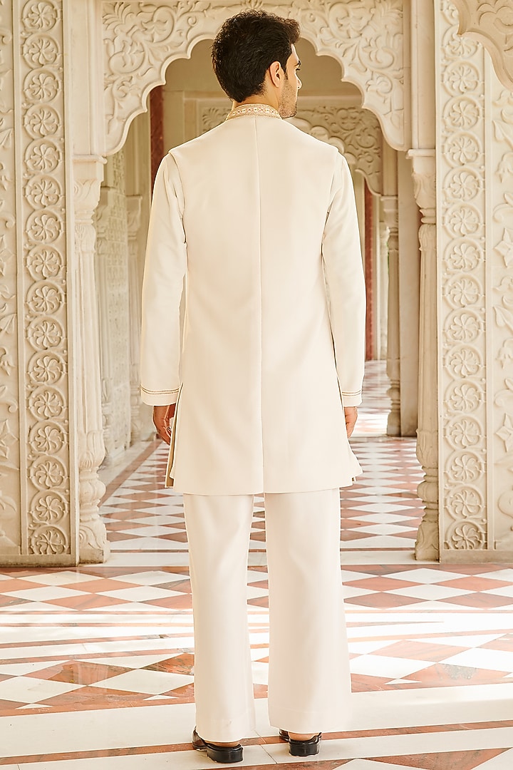Cream Twill Suiting Hand & Machine Embroidered Wedding Sherwani Set by Contrast By Parth at Pernia's Pop Up Shop
