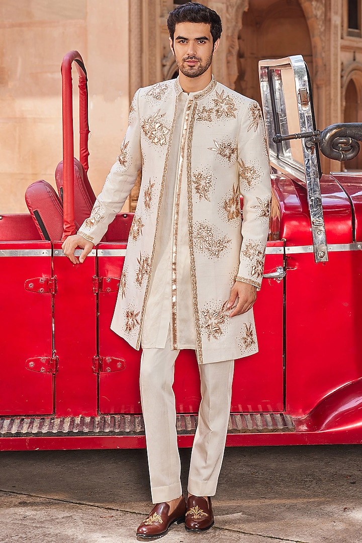 Ivory Raw Silk Floral Embellished Open Wedding Sherwani Set by Contrast By Parth at Pernia's Pop Up Shop