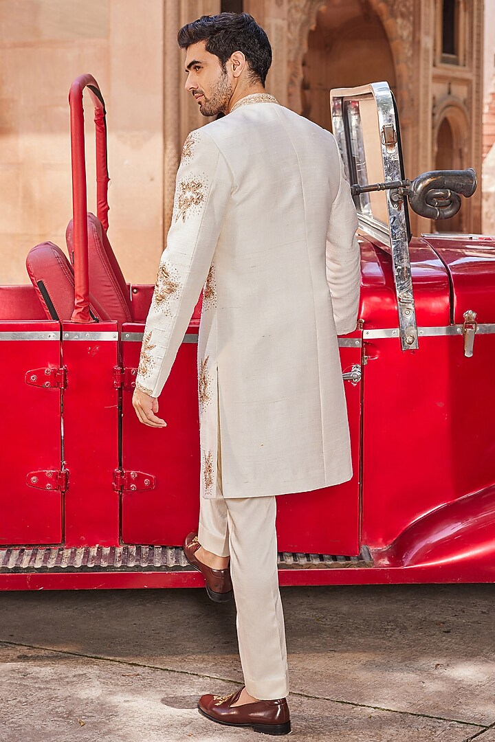 Ivory Raw Silk Floral Embellished Open Wedding Sherwani Set by Contrast By Parth at Pernia's Pop Up Shop