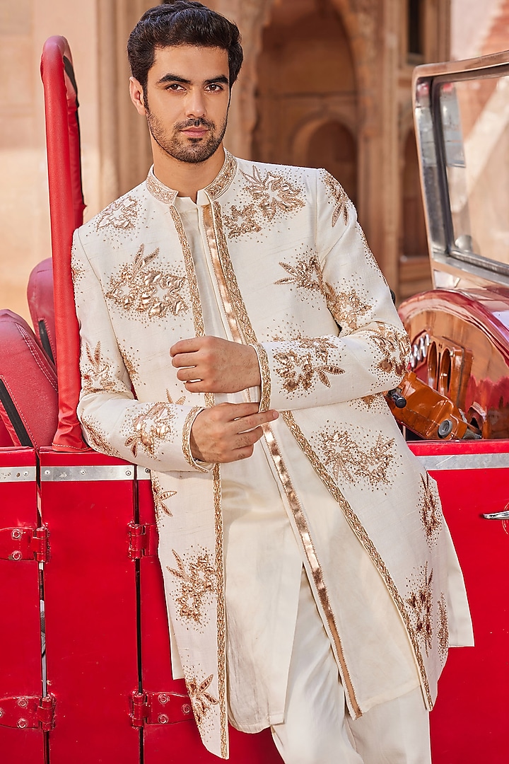 Ivory Raw Silk Floral Embellished Open Wedding Sherwani Set by Contrast By Parth at Pernia's Pop Up Shop