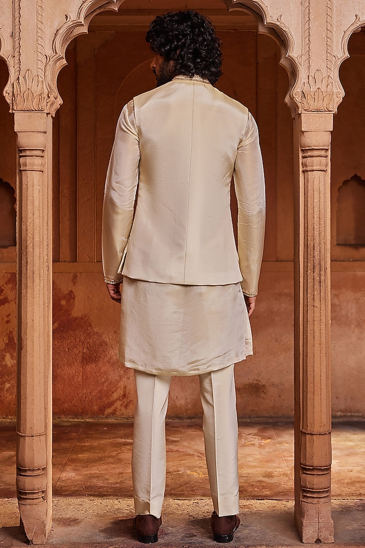 Cream Silk Organza Zari Embroidered Nehru Jacket Set by Contrast By Parth at Pernia's Pop Up Shop