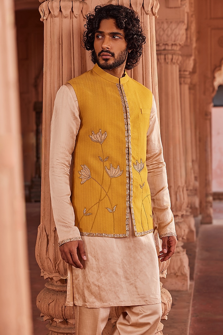 Mustard Textured Silk Applique Hand Embellished Nehru Jacket Set by Contrast By Parth at Pernia's Pop Up Shop