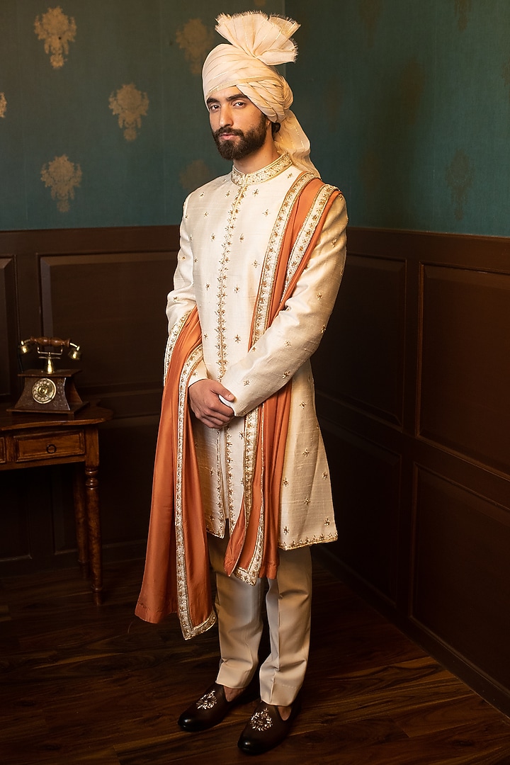 Beige Raw Silk Hand Embroidered Groom Sherwani Set by Contrast By Parth at Pernia's Pop Up Shop