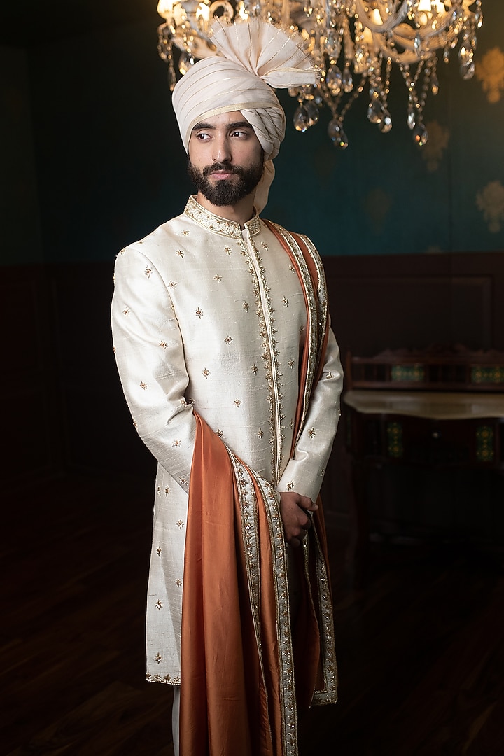 Beige Raw Silk Hand Embroidered Groom Sherwani Set by Contrast By Parth at Pernia's Pop Up Shop