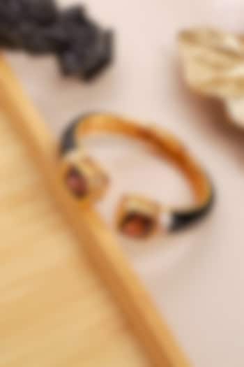 Gold Finish Black Enameled Cubic Zirconia Kada by Curio Cottage at Pernia's Pop Up Shop