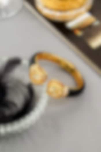 Gold Finish Black Enameled Cubic Zirconia Kada by Curio Cottage at Pernia's Pop Up Shop