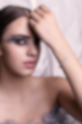 White Finish Cubic Zirconia Openable Bracelet by Curio Cottage at Pernia's Pop Up Shop