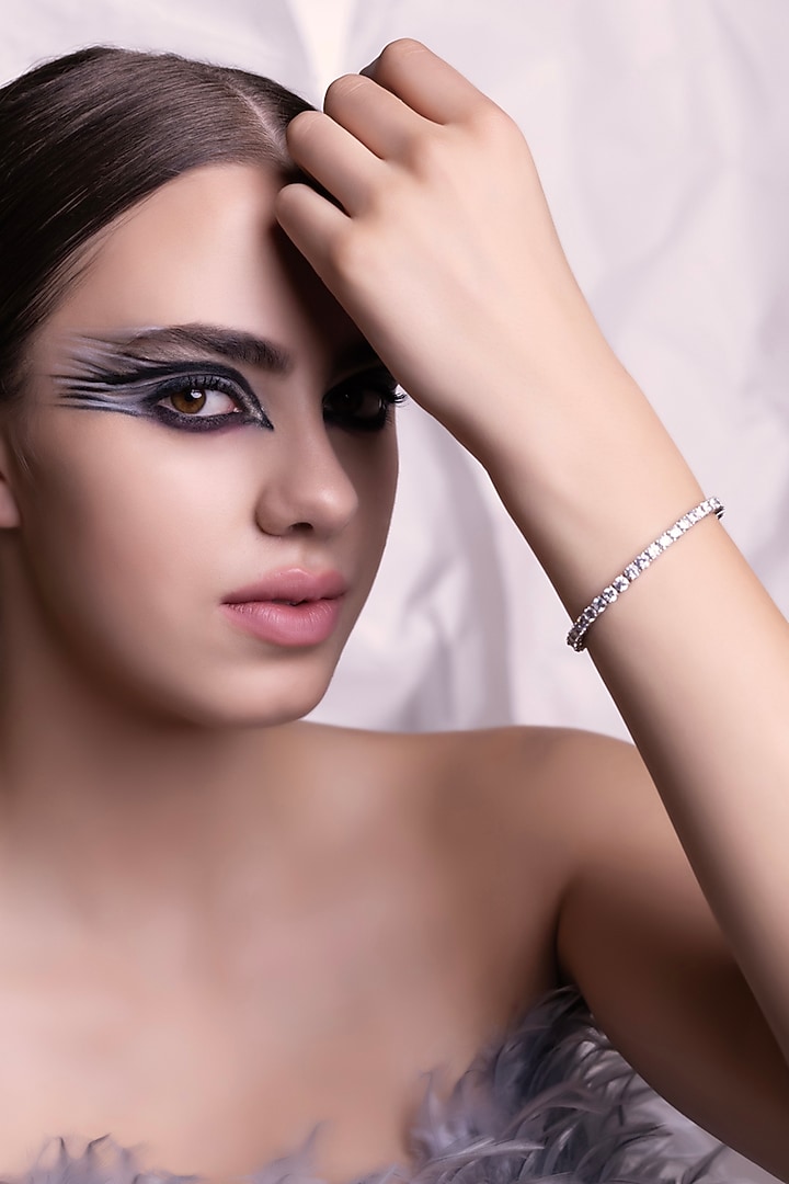 White Finish Cubic Zirconia Openable Bracelet by Curio Cottage at Pernia's Pop Up Shop