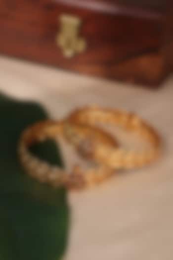 Gold Plated Laxmi Motif Bangles (Set Of 2) by Curio Cottage at Pernia's Pop Up Shop