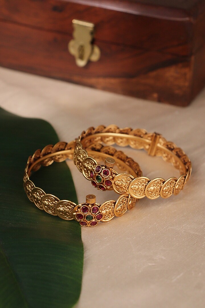 Gold Plated Laxmi Motif Bangles (Set Of 2) by Curio Cottage at Pernia's Pop Up Shop