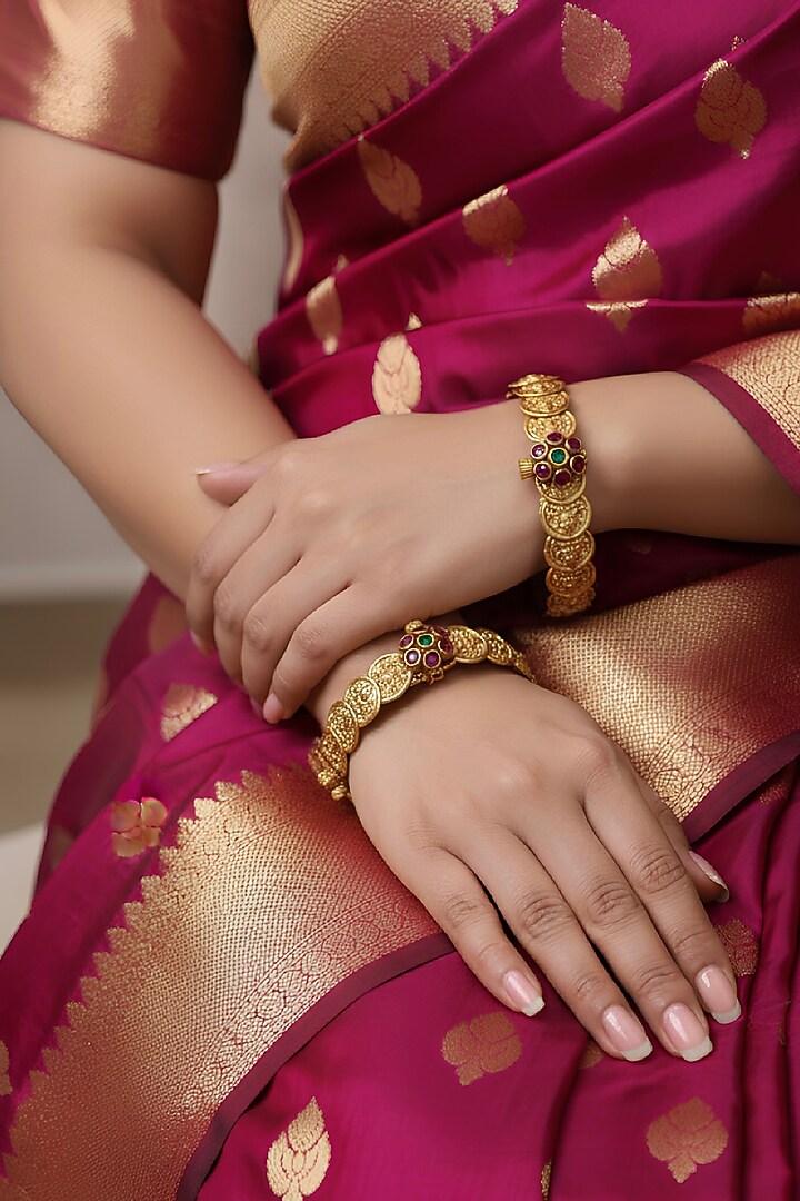 Gold Plated Laxmi Motif Bangles (Set Of 2) by Curio Cottage at Pernia's Pop Up Shop