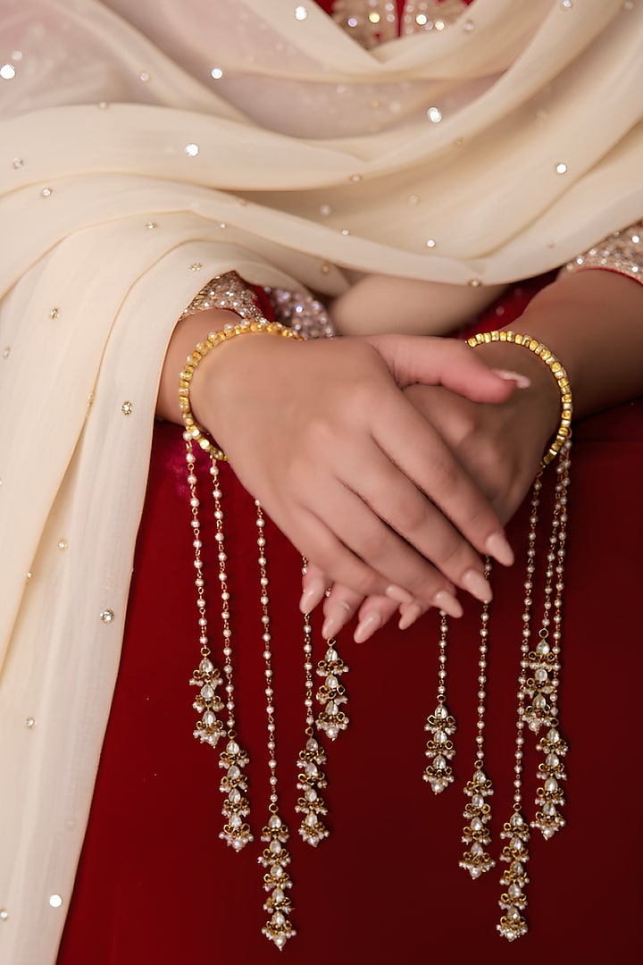 Gold Plated Kundan Polki Kaleera Bangles (Set Of 2) by Curio Cottage at Pernia's Pop Up Shop