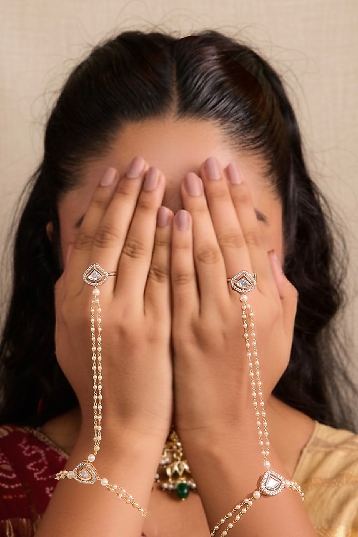 Gold Plated Kundan Polki & Pearl Haathphools (Set Of 2) by Curio Cottage at Pernia's Pop Up Shop