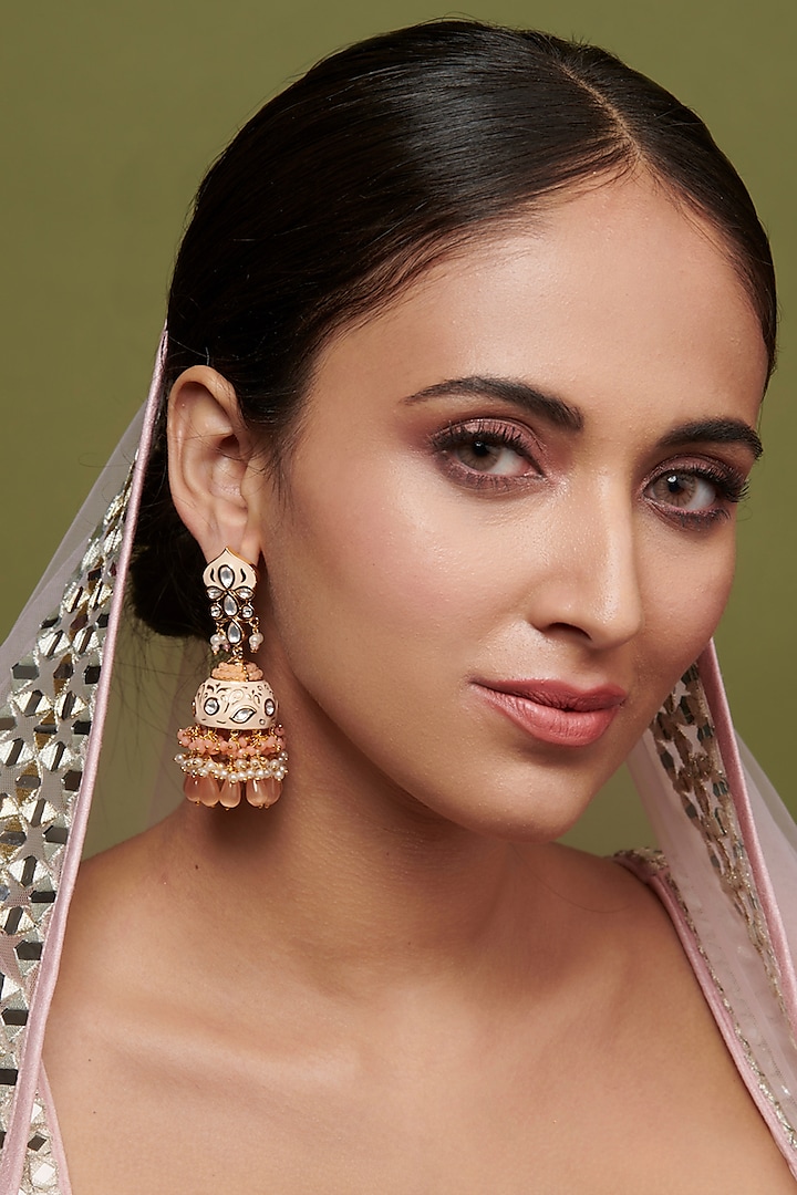 Gold Finish Light Peach Enameled Jhumka Bridal Earrings by Curio Cottage at Pernia's Pop Up Shop