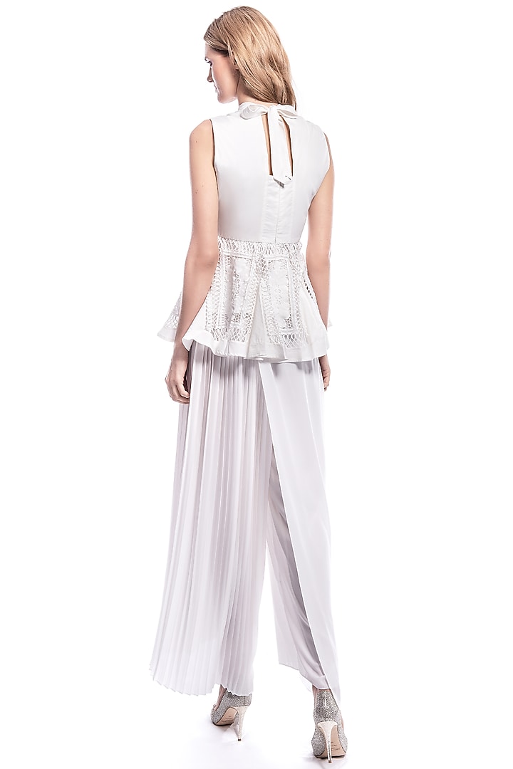 White Peplum Top With Lace Detailing by Curador at Pernia's Pop Up Shop