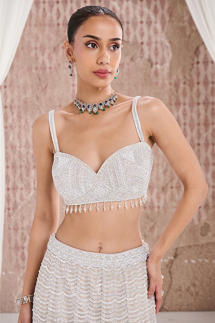 Ivory Organza Sequins Embroidered Fish-Cut Bridal Lehenga Set by DISHA ARORA at Pernia's Pop Up Shop