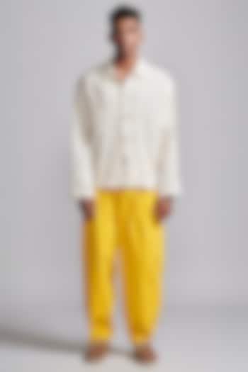 Yellow Cotton Bishop Pleated Pants by Dash and Dot Men