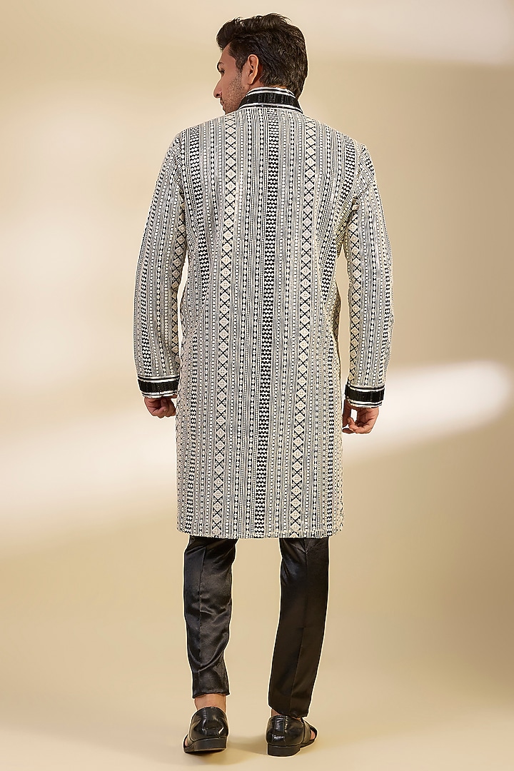 Black Dupion Silk Salli Embroidered Kurta Set by Dapper & Dare at Pernia's Pop Up Shop