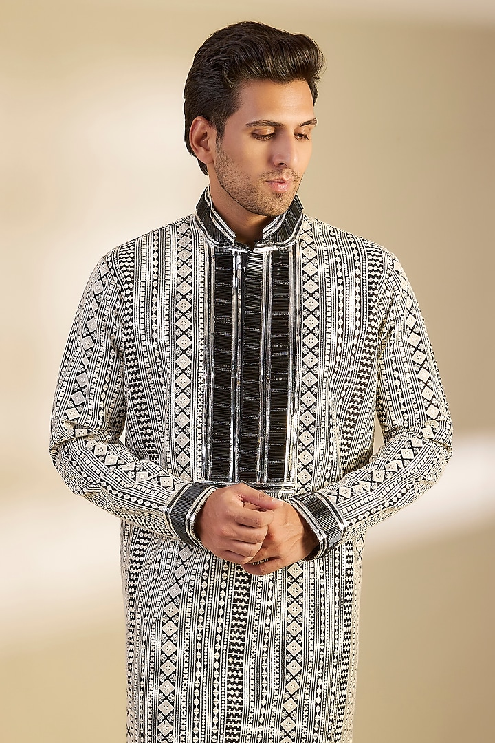 Black Dupion Silk Salli Embroidered Kurta Set by Dapper & Dare at Pernia's Pop Up Shop