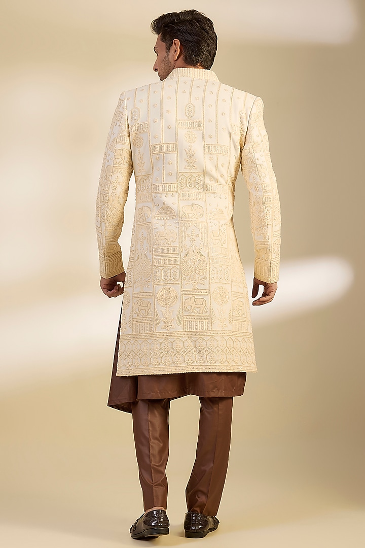 Cream Georgette Motif Embroidered Groom Sherwani Set by Dapper & Dare at Pernia's Pop Up Shop