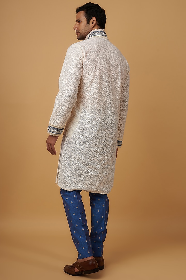 White Lucknowi Embroidered Handcrafted Kurta Set by Dapper & Dare at Pernia's Pop Up Shop