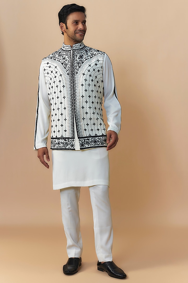 White Japanese Crepe Hand & Machine Embroidered Bundi Jacket Set by Dapper & Dare