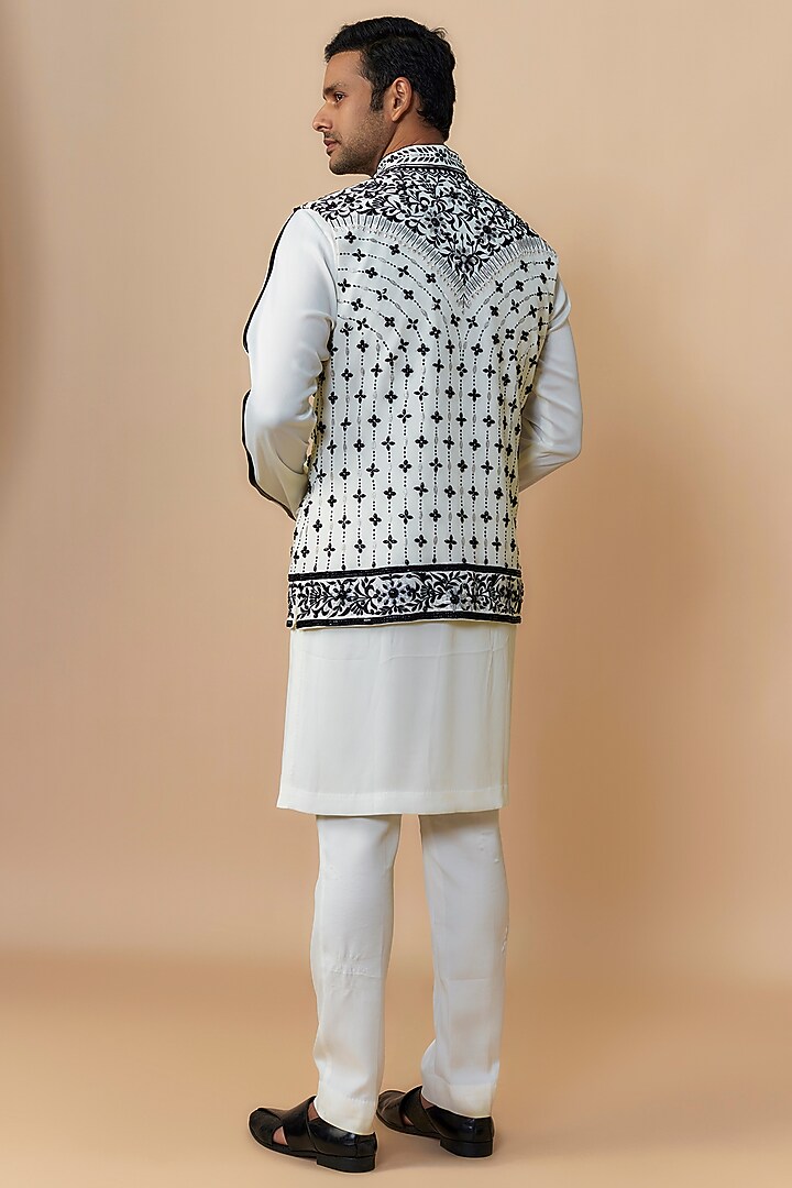 White Japanese Crepe Hand & Machine Embroidered Bundi Jacket Set by Dapper & Dare at Pernia's Pop Up Shop
