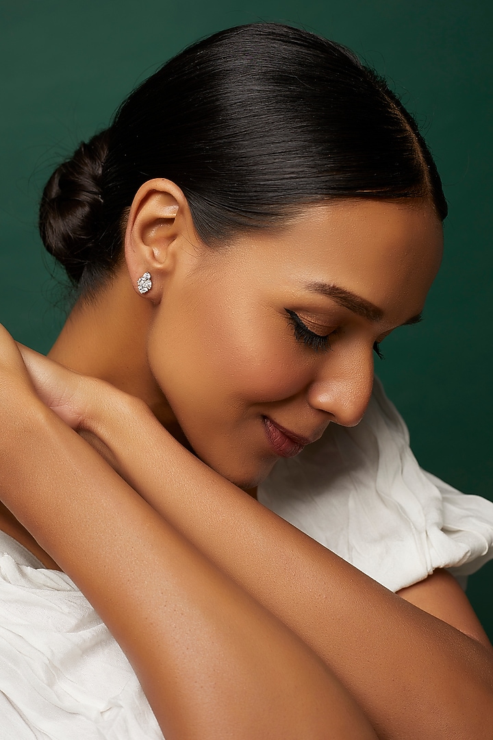 White Finish Swarovski Zirconia Stud Earrings In Sterling Silver by Diosa Paris Jewellery at Pernia's Pop Up Shop
