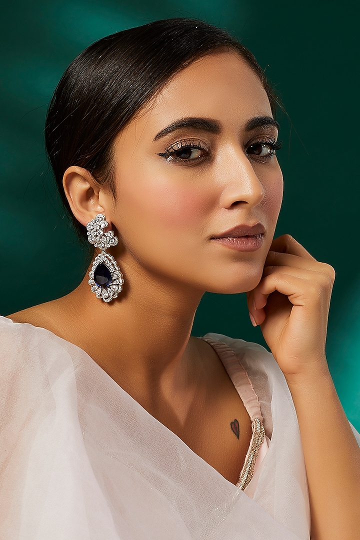 White Finish White & Blue Swarovski Zirconia Dangler Earrings In Sterling Silver by Diosa Paris Jewellery at Pernia's Pop Up Shop