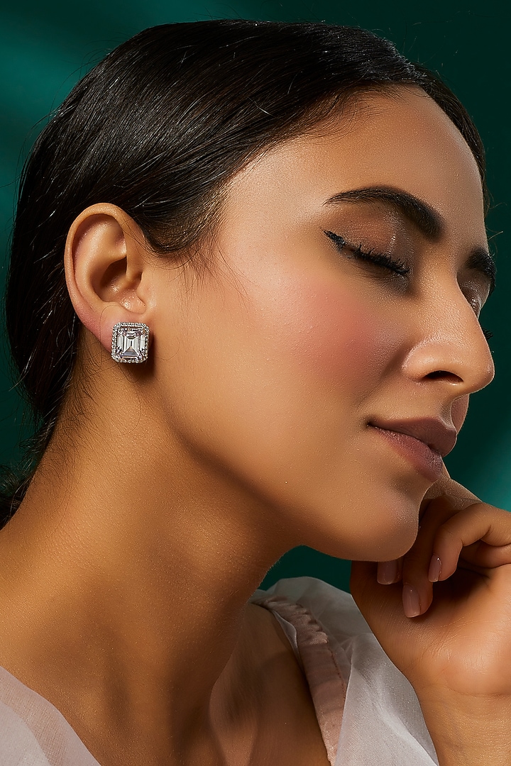 White Finish Swarovski Zirconia Stud Earrings In Sterling Silver by Diosa Paris Jewellery at Pernia's Pop Up Shop