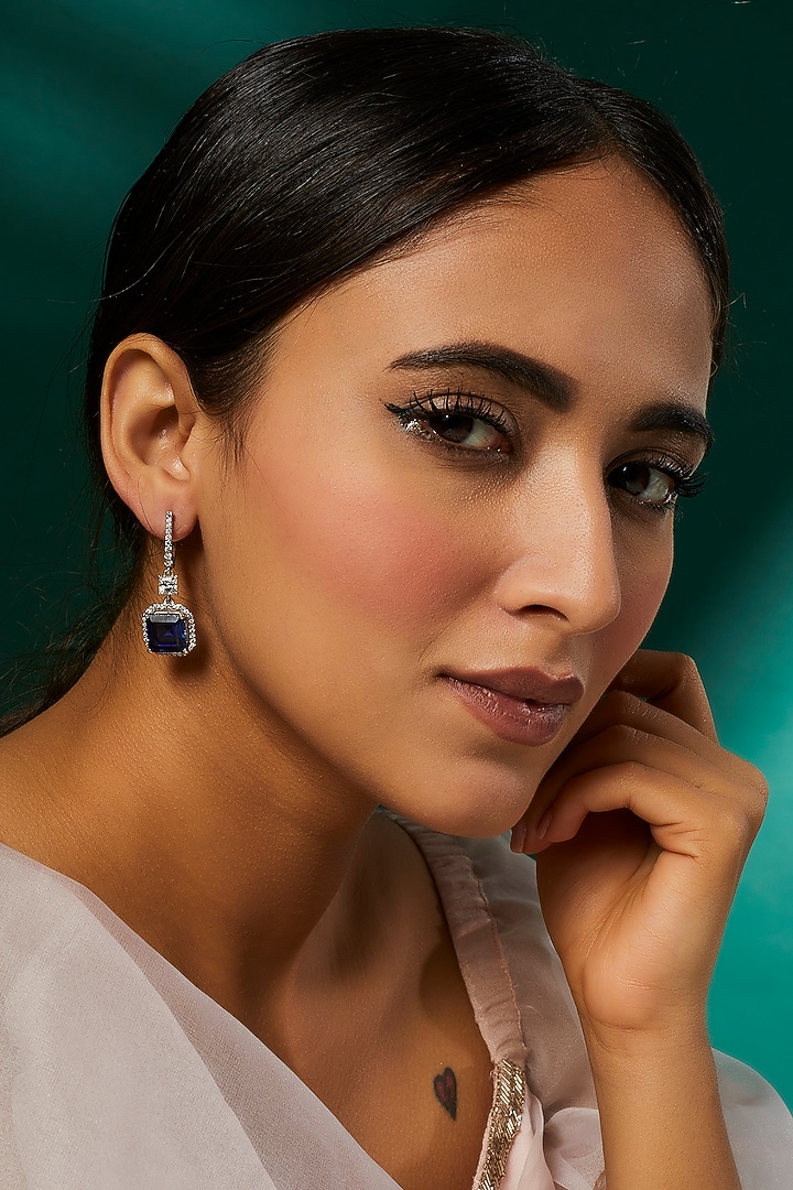 White Finish White & Blue Swarovski Zirconia Dangler Earrings In Sterling Silver by Diosa Paris Jewellery at Pernia's Pop Up Shop