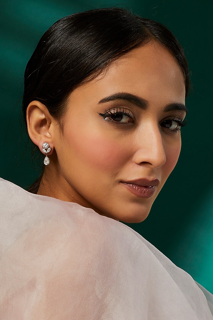 White Finish Swarovski Zirconia Dangler Earrings In Sterling Silver by Diosa Paris Jewellery at Pernia's Pop Up Shop