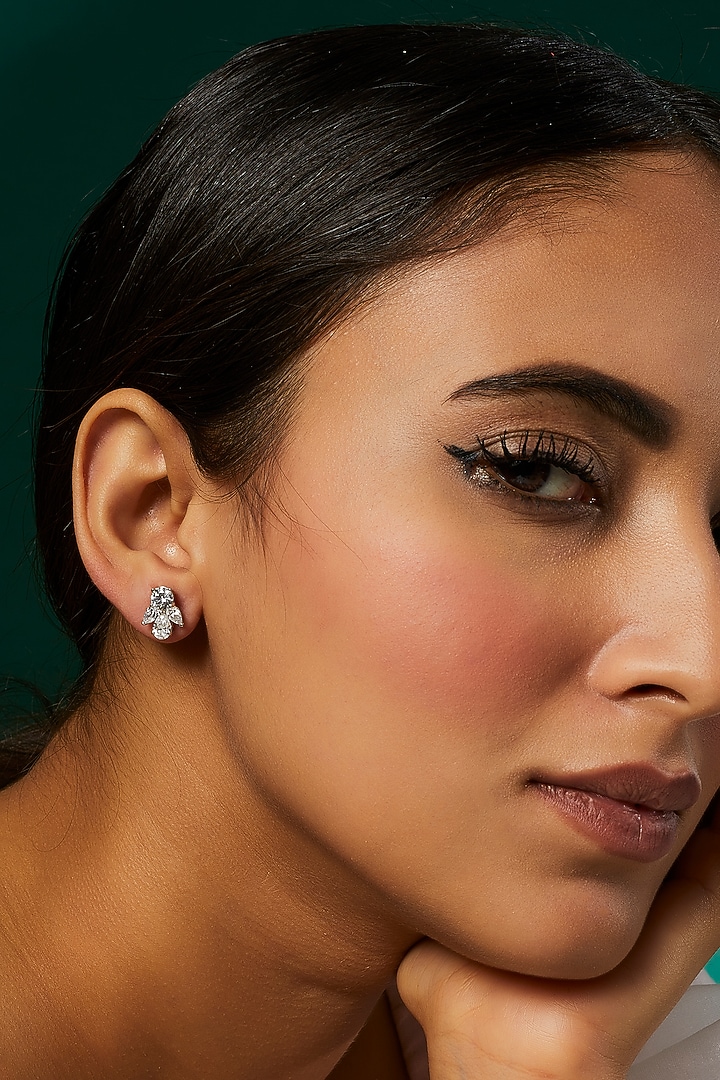 White Finish Swarovski Zirconia Stud Earrings In Sterling Silver by Diosa Paris Jewellery at Pernia's Pop Up Shop