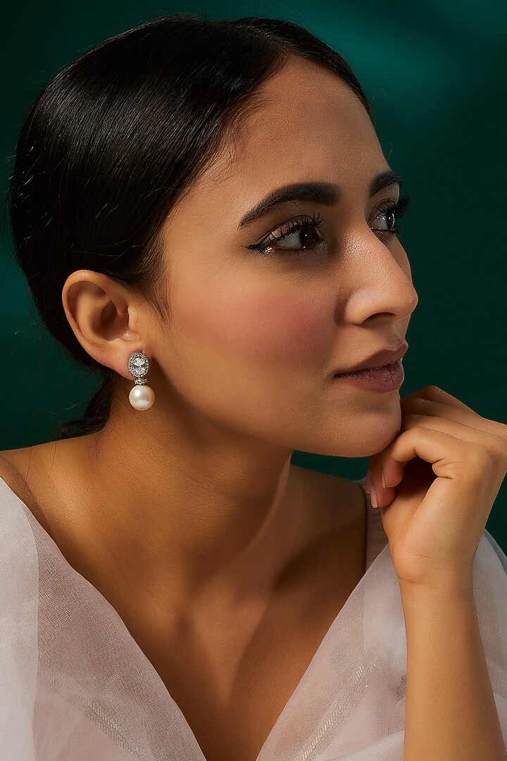 White Finish Swarovski Zirconia & Pearl Dangler Earrings In Sterling Silver by Diosa Paris Jewellery at Pernia's Pop Up Shop