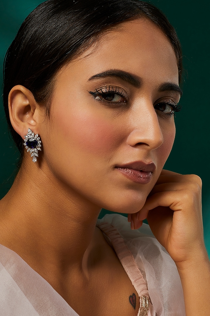 White Finish White & Blue Swarovski Zirconia Dangler Earrings In Sterling Silver by Diosa Paris Jewellery at Pernia's Pop Up Shop