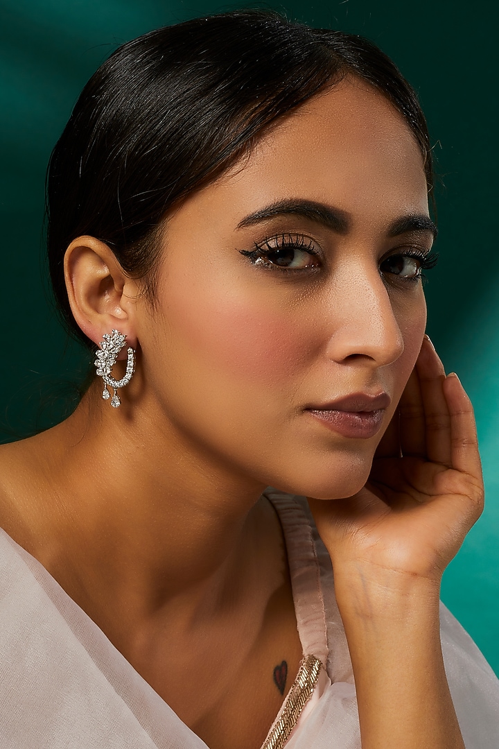 White Finish Swarovski Zirconia Dangler Earrings In Sterling Silver by Diosa Paris Jewellery at Pernia's Pop Up Shop