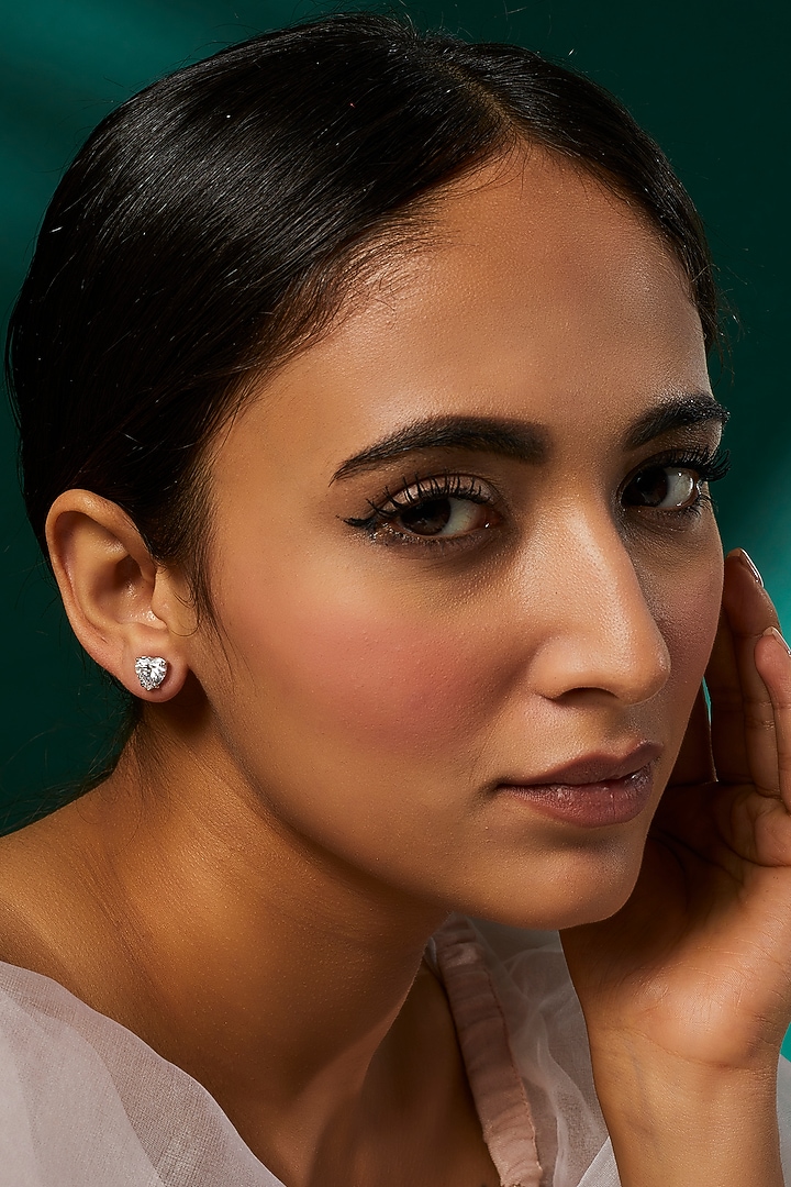 White Finish Swarovski Zirconia Stud Earrings In Sterling Silver by Diosa Paris Jewellery at Pernia's Pop Up Shop