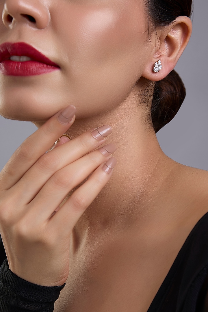 White Finish White Stone Stud Earrings In Sterling Silver by Diosa Paris Jewellery at Pernia's Pop Up Shop