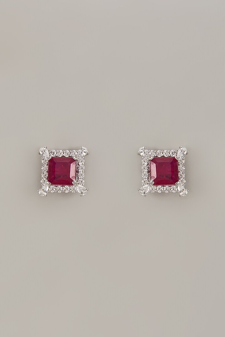 White Finish Zircon & Synthetic Ruby Stone Stud Earrings In Sterling Silver by Diosa Paris Jewellery at Pernia's Pop Up Shop