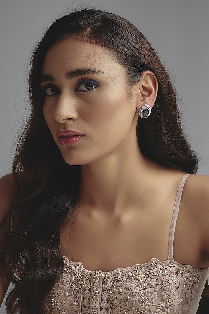 White Finish Zircon & Synthetic Sapphire Stone Stud Earrings In Sterling Silver by Diosa Paris Jewellery at Pernia's Pop Up Shop
