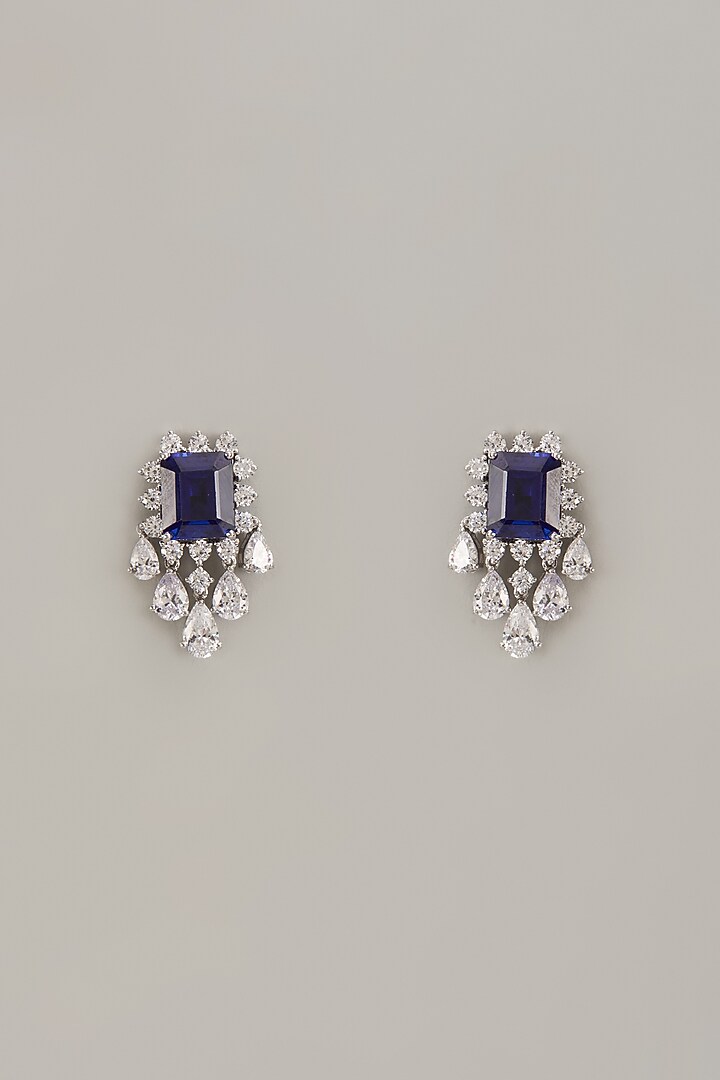 White Finish Zircon & Synthetic Sapphire Stone Stud Earrings In Sterling Silver by Diosa Paris Jewellery at Pernia's Pop Up Shop