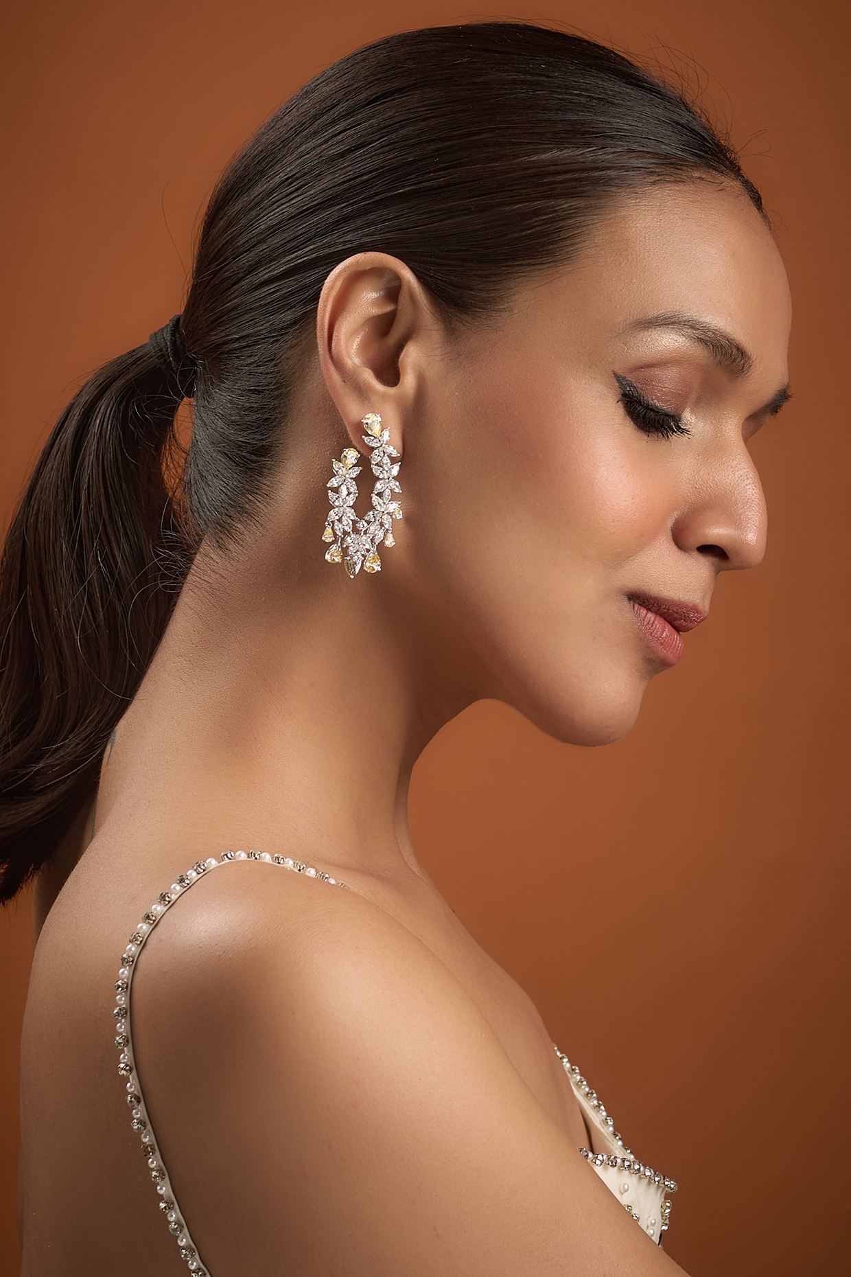 White Finish Zircon Dangler Earrings In Sterling Silver by Diosa Paris Jewellery at Pernia's Pop Up Shop