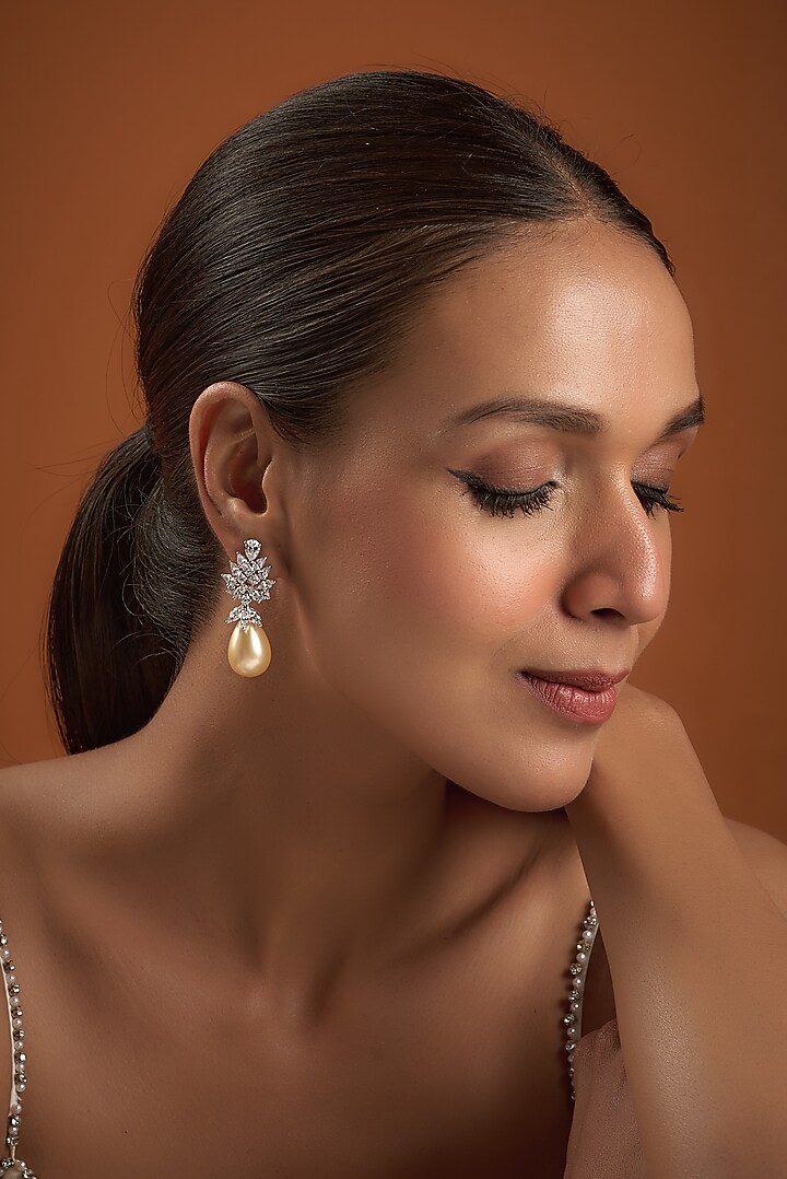 White Finish Zircon & Pearl Dangler Earrings In Sterling Silver by Diosa Paris Jewellery at Pernia's Pop Up Shop