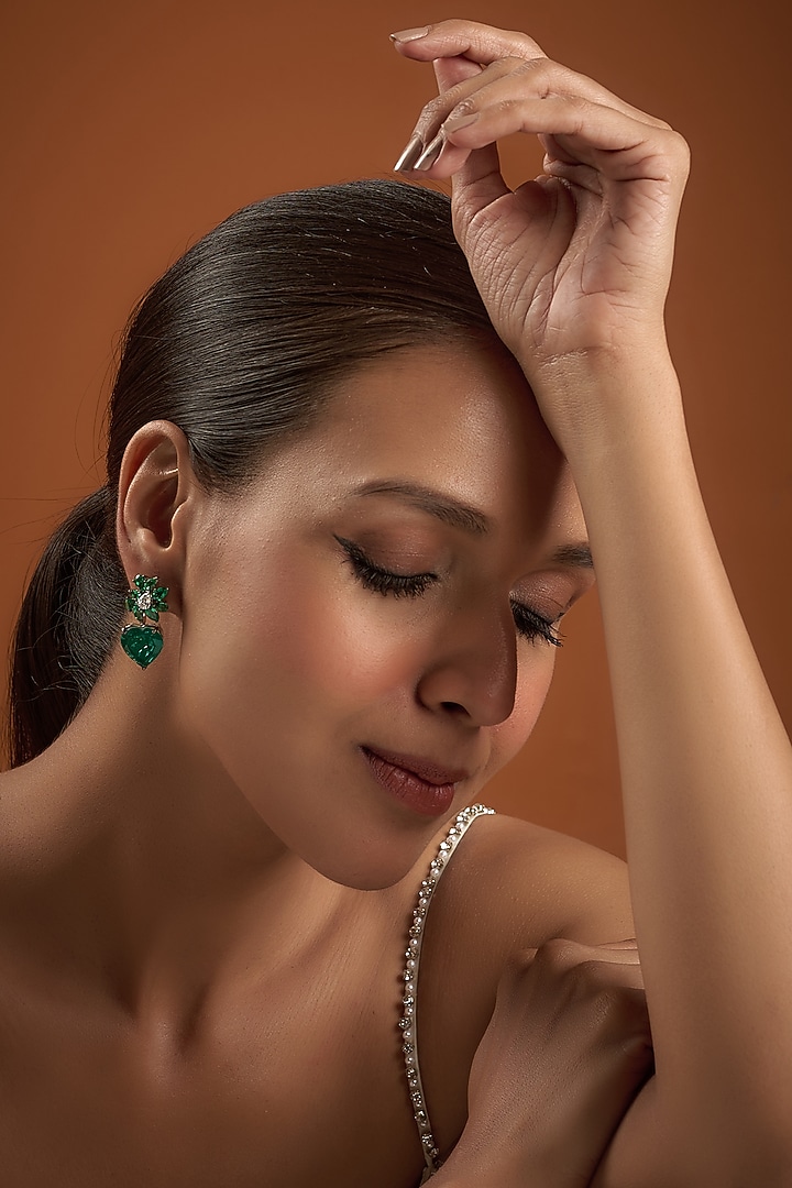 White Finish Synthetic Emerald Stone Dangler Earrings In Sterling Silver by Diosa Paris Jewellery at Pernia's Pop Up Shop