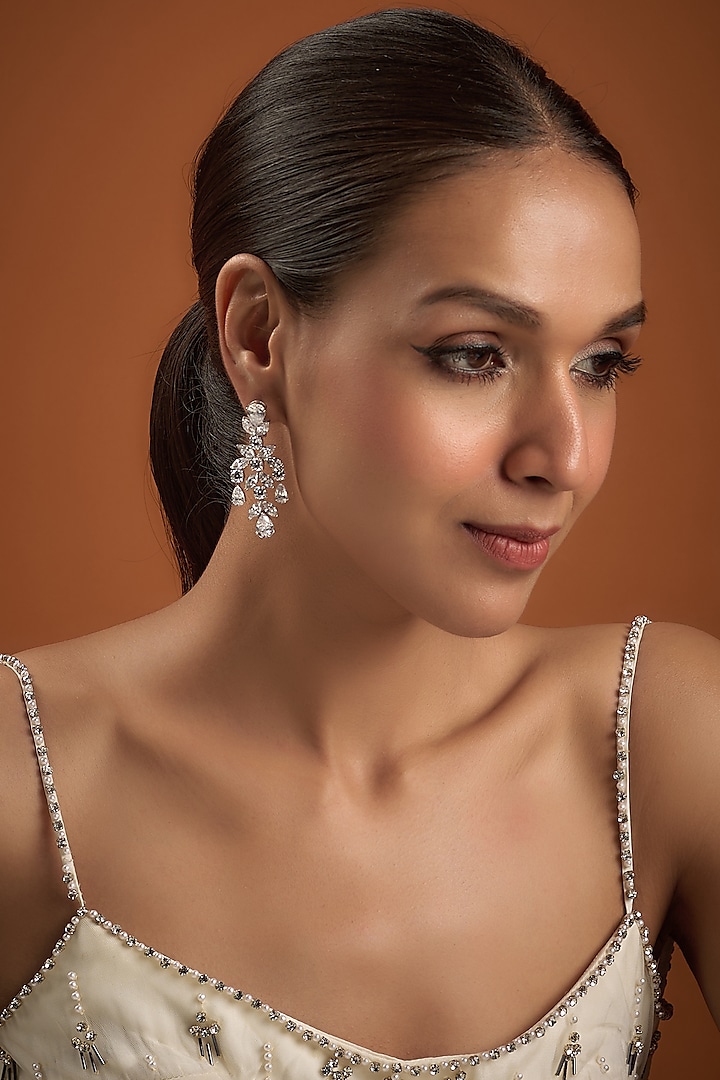 White Finish Zircon Dangler Earrings In Sterling Silver by Diosa Paris Jewellery at Pernia's Pop Up Shop