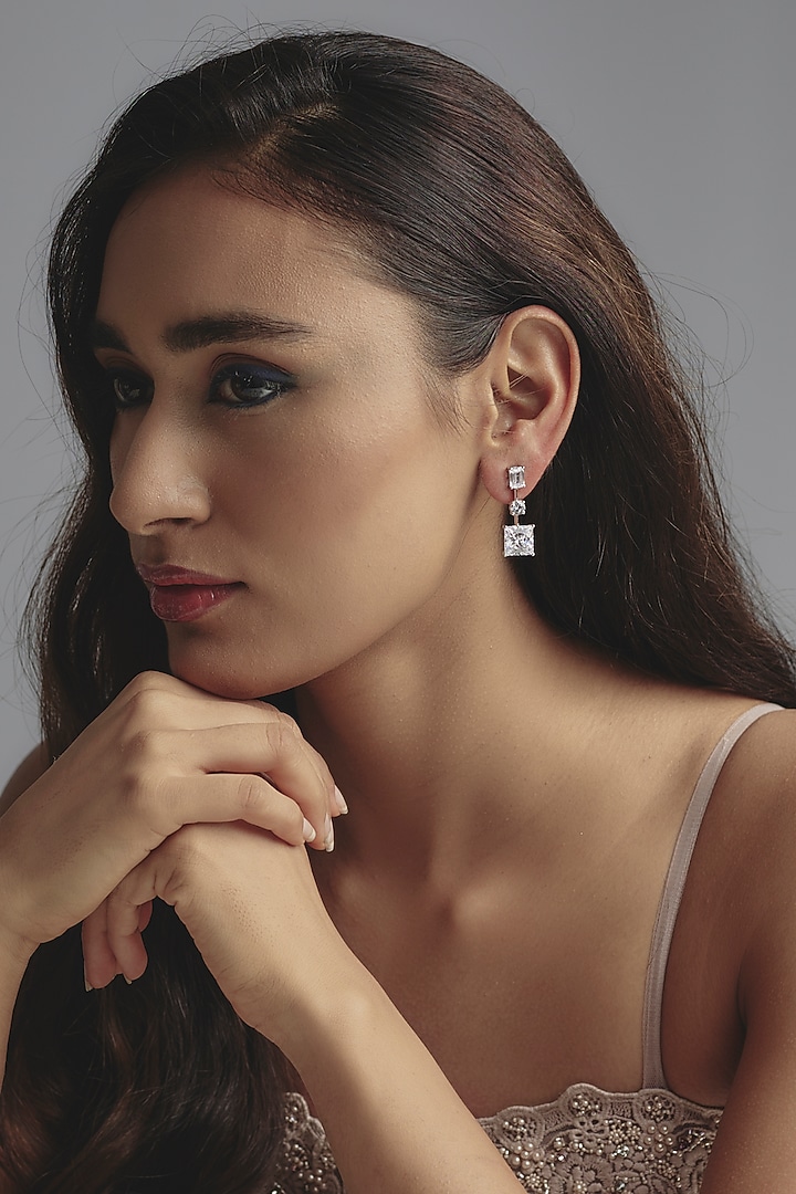White Finish Zircon Dangler Earrings In Sterling Silver by Diosa Paris Jewellery at Pernia's Pop Up Shop