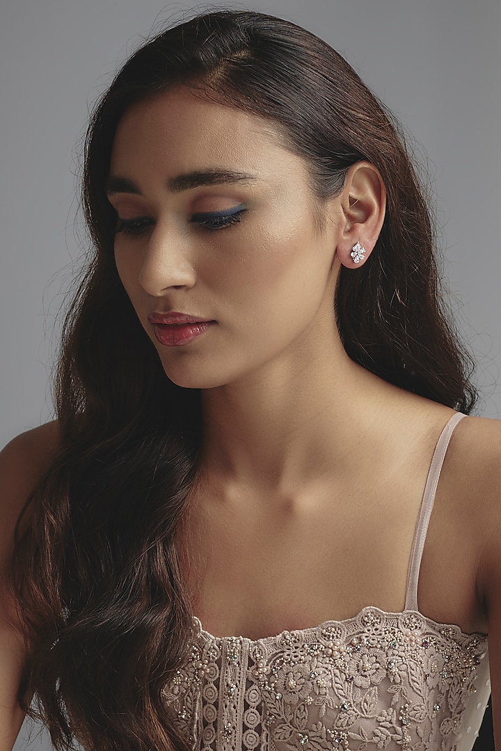 White Finish Swarovski Zirconia Stud Earrings In Sterling Silver by Diosa Paris Jewellery at Pernia's Pop Up Shop